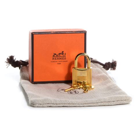 hermes cadena lock|HERMES Cadena Lock and Key Set Gold .